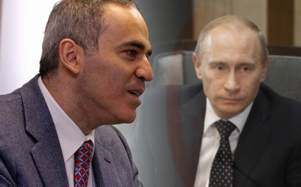 Лидер Объединенного гражданского фронта Гарри Каспаров. В.В.Путин на заднем плане