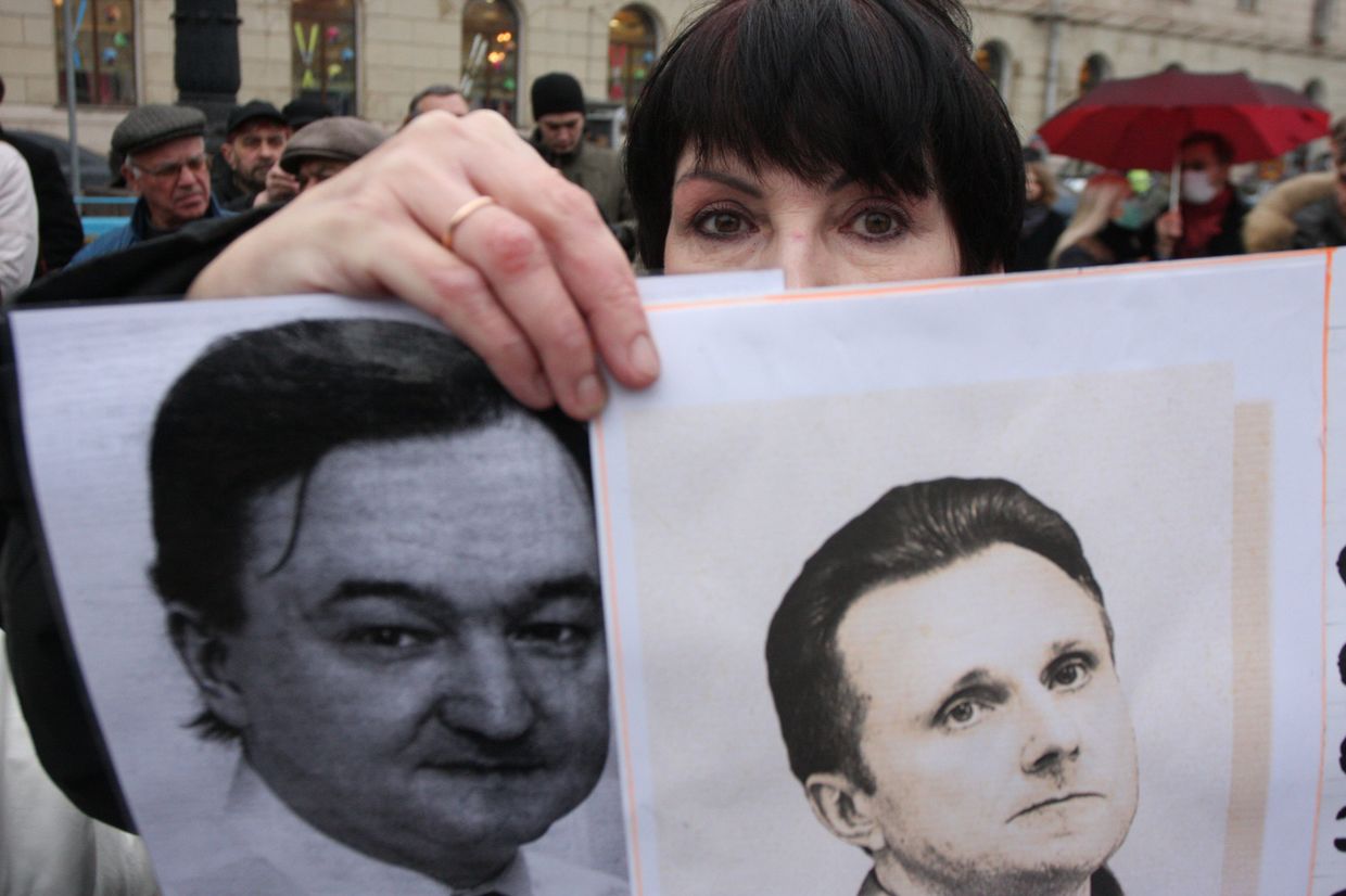 Участница митинга за реформу правоохранительных органов