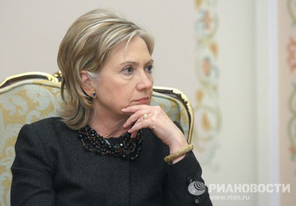 Госсекретарь США Хиллари Клинтон на встрече с премьер-министр РФ Владимиром Путиным