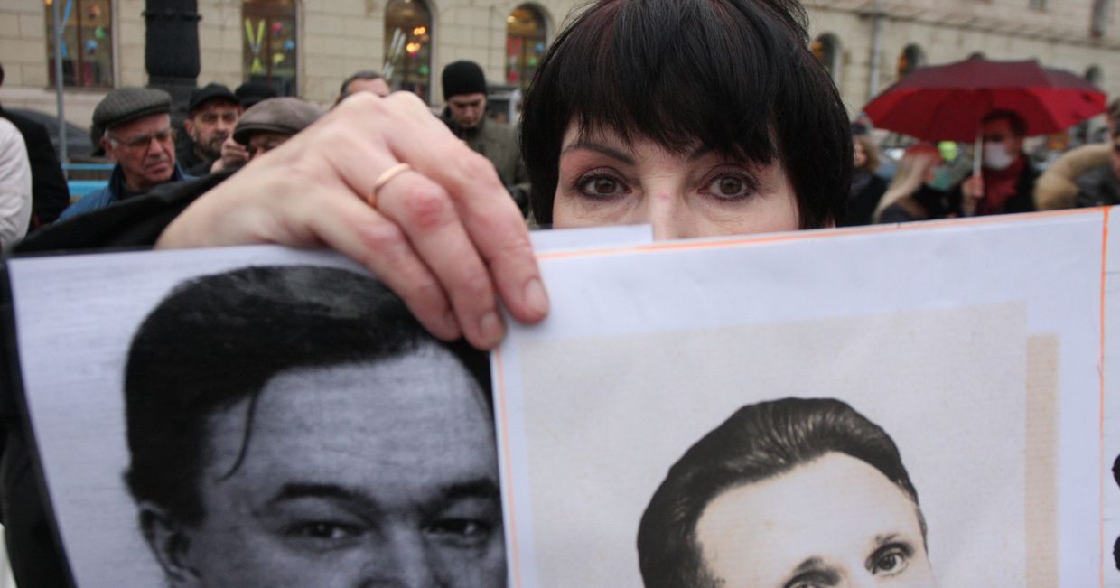 Участница митинга за реформу правоохранительных органов