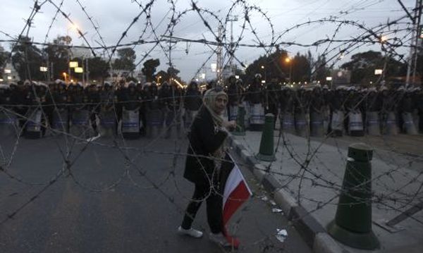 Участница протеста в Каире, Египет