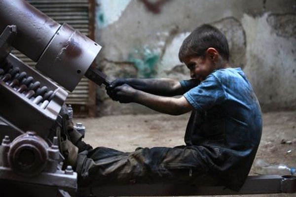 Десятилетний мальчик Исса из города Алеппо в Сирии