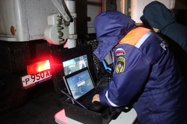Работа спасателей на месте крушения самолета в Казани. Фото с места событий