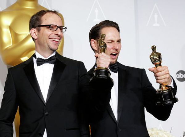 Режиссёры Лоран Уиц и Александр Эспигарес на 86-й церемонии вручения премии Оскар
