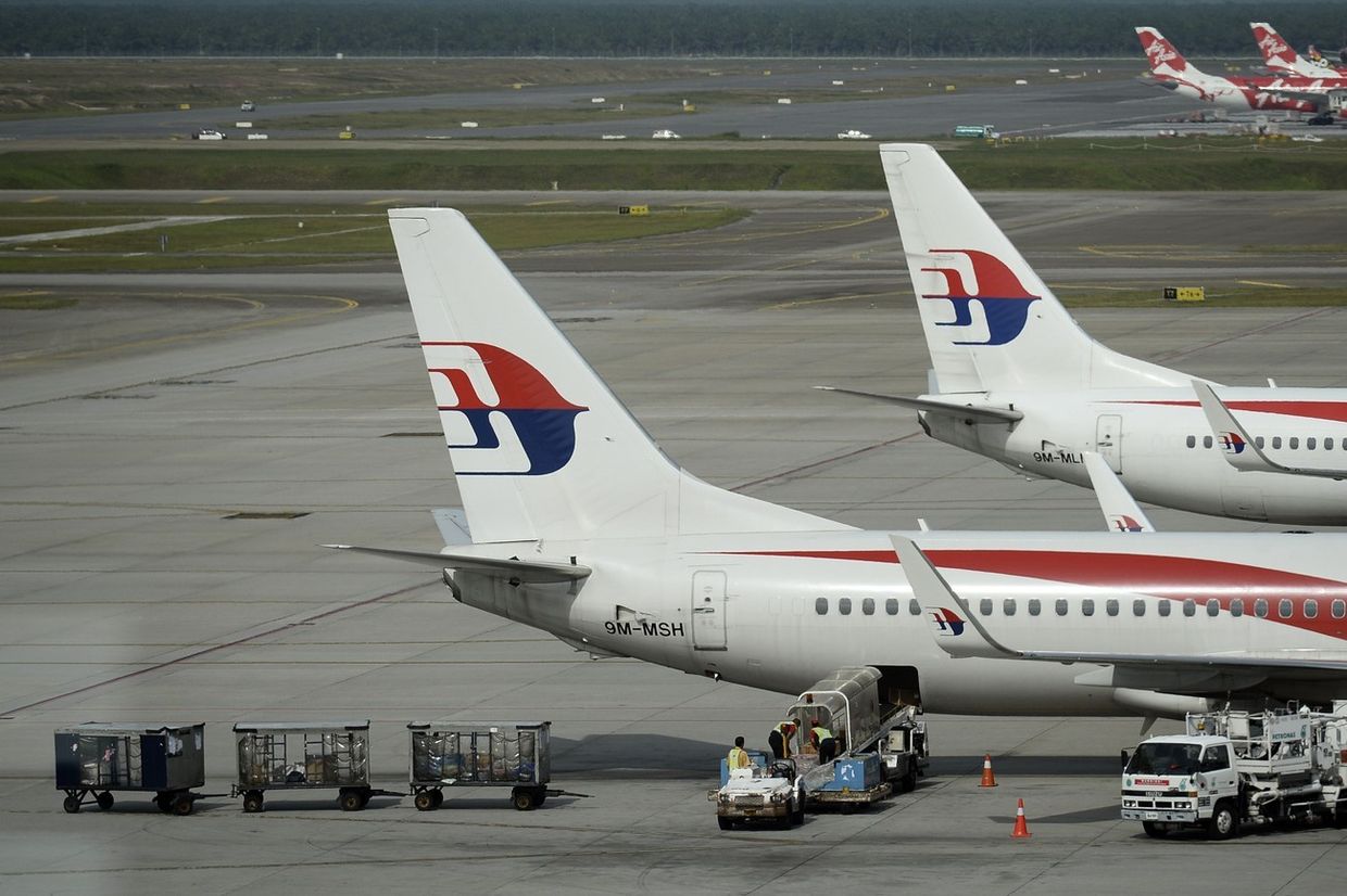 Самолеты компании Malaysia Airlines в аэропорту Куала-Лумпура