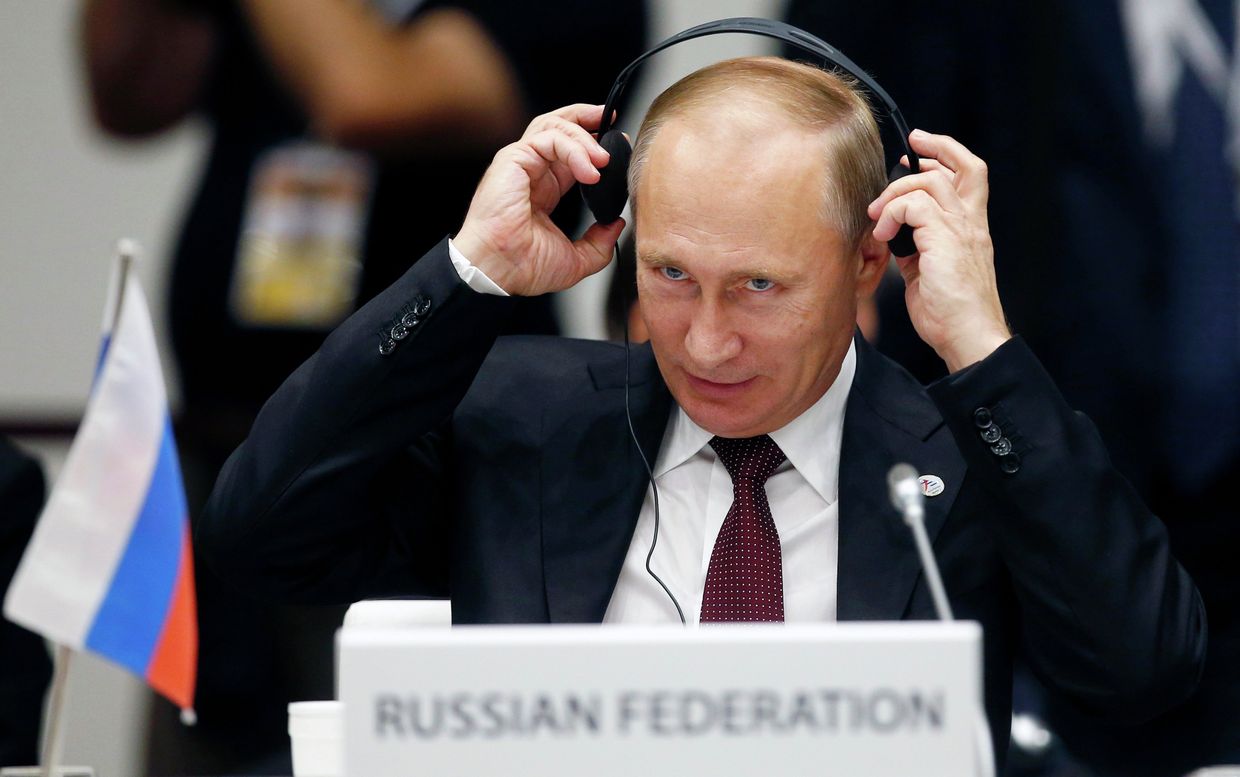 Президент РФ Владимир Путин на заседании саммита форума Азия-Европа 17 октября 2014