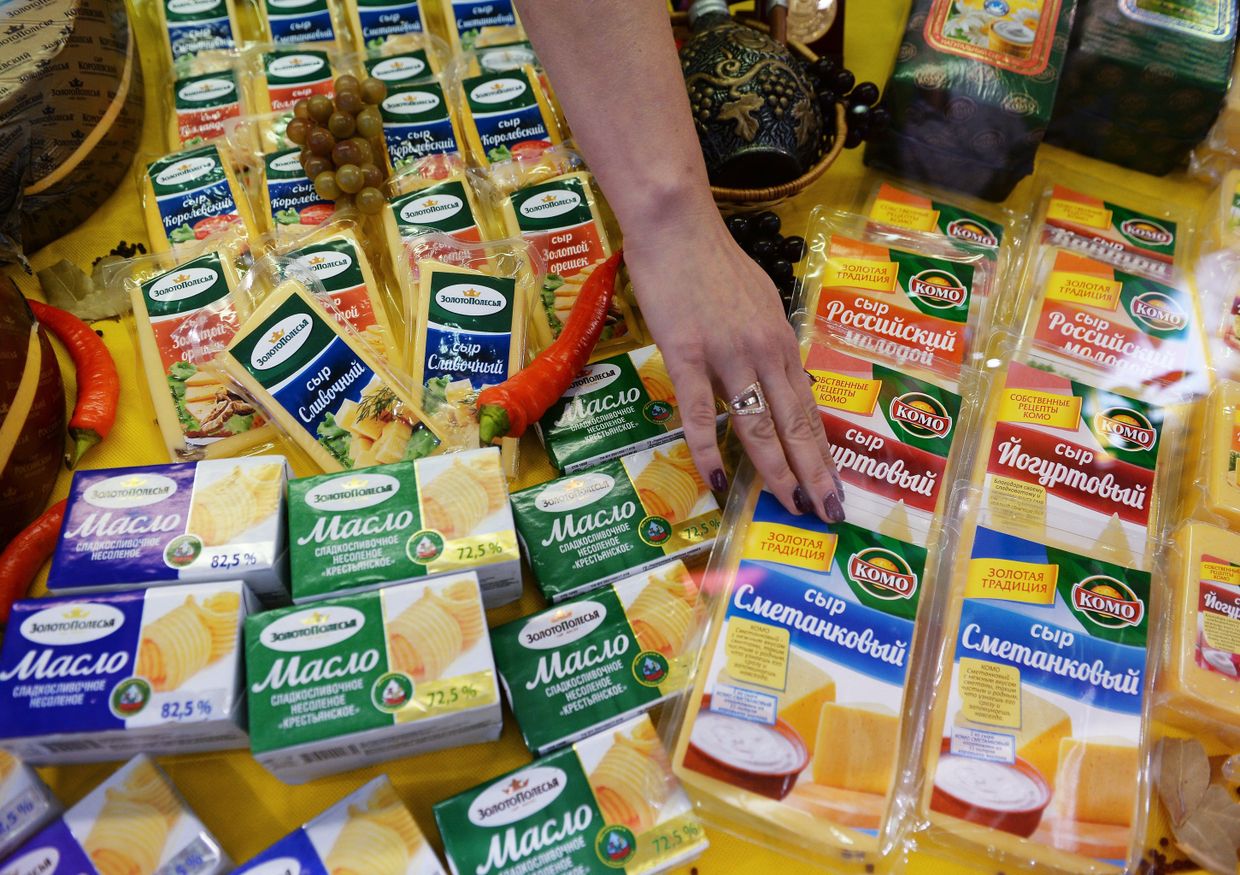 Молочная продукция украинского производителя сыров компании Комо и белорусской торговой марки Золото Полесья