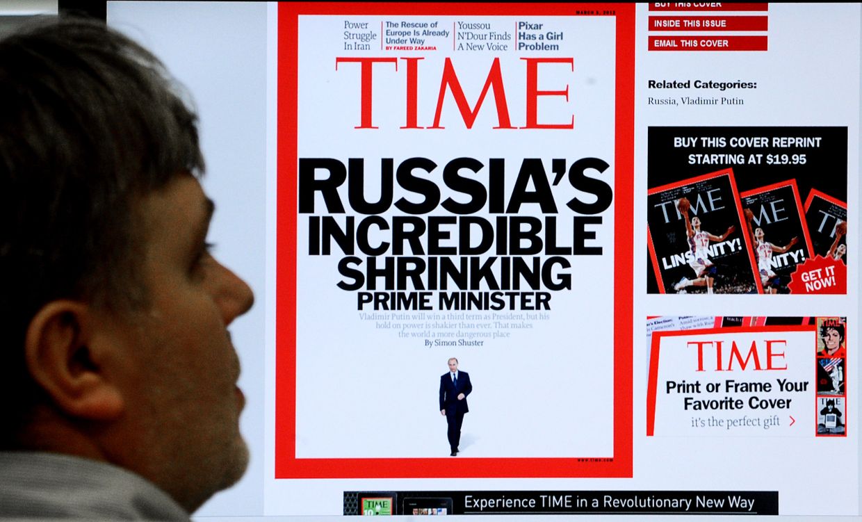 Обложка журнала Time на экране монитора