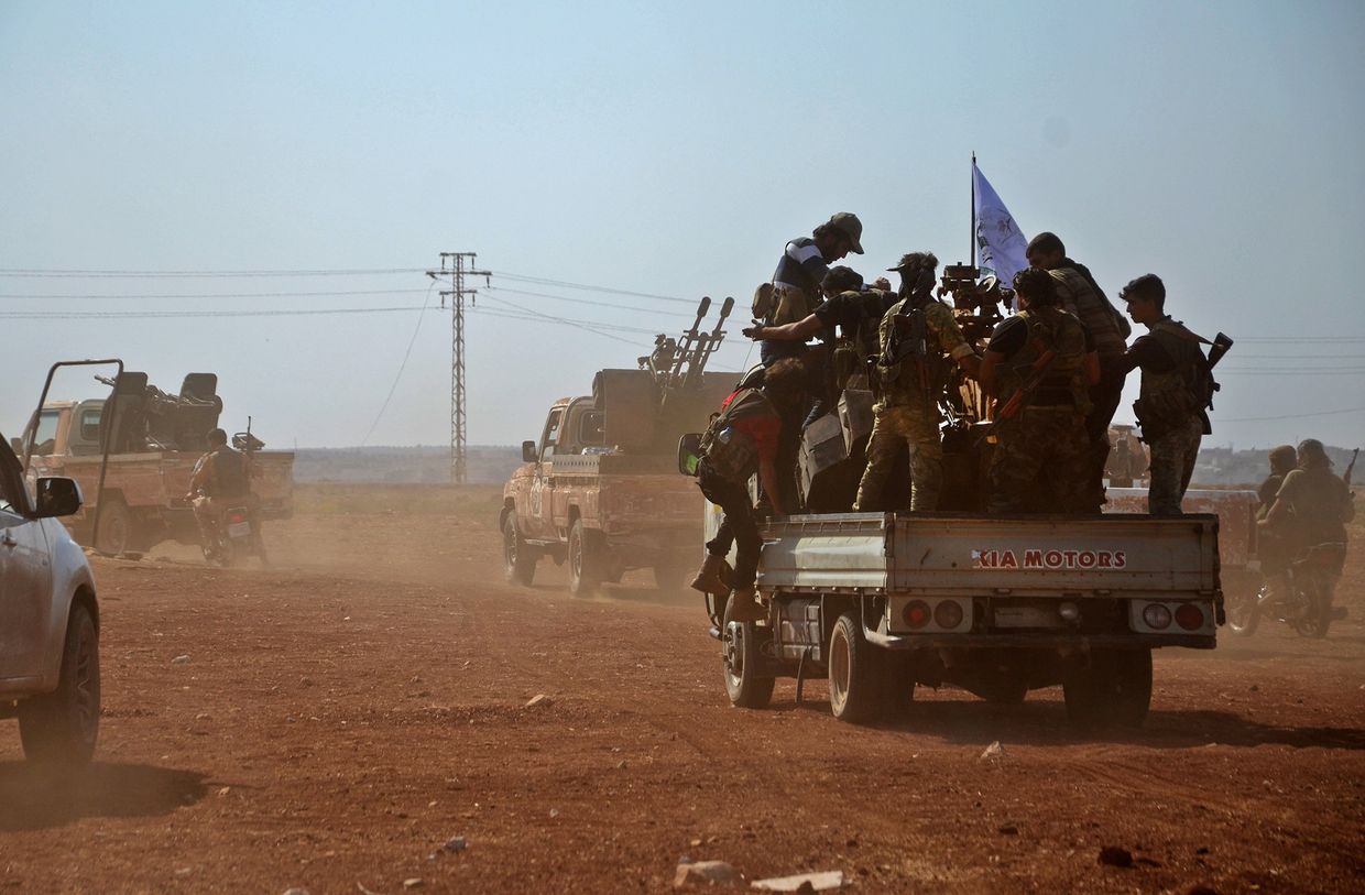 Бойцы Свободной сирийской армии в сирийском поселке Бераан