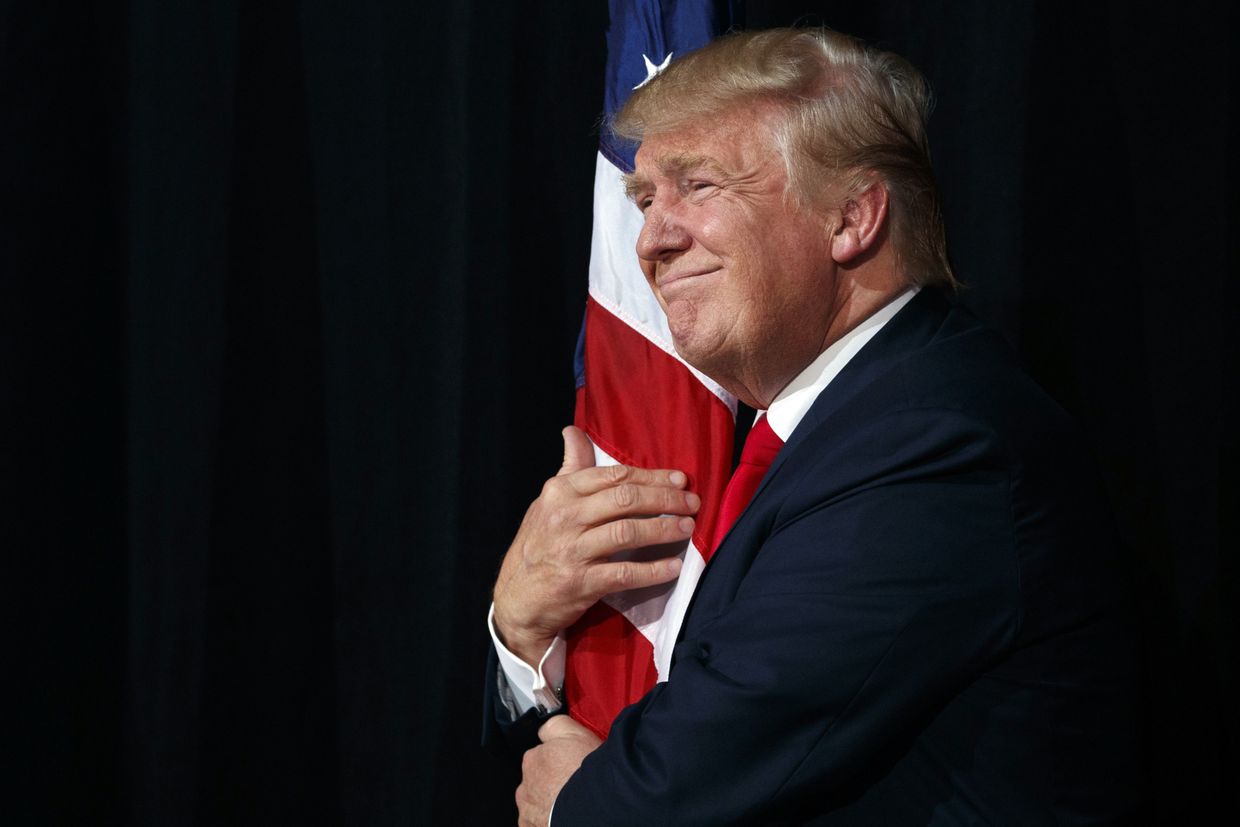 Кандидат в президенты США Дональд Трамп во время предвыборной кампании в городе Тампа штата Флорида. 24 октября 2016 года