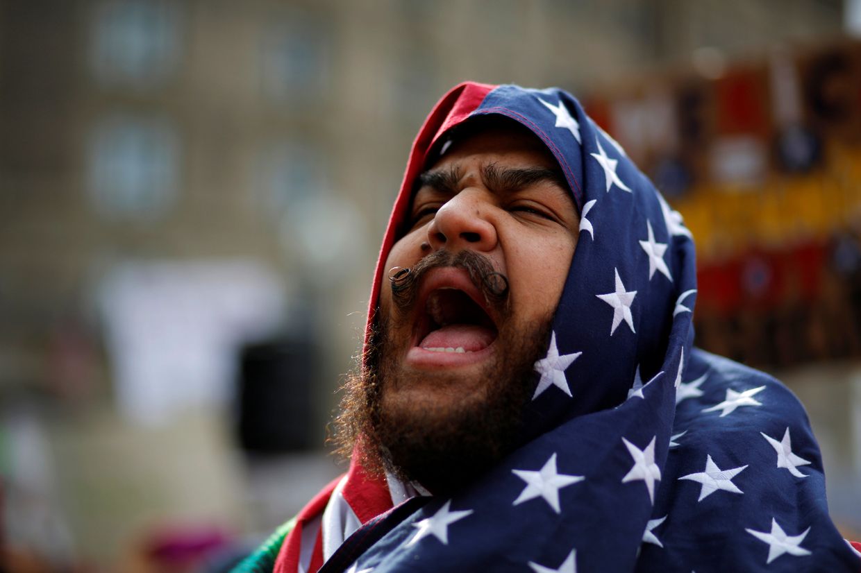 Акция протеста против миграционной политики трампа