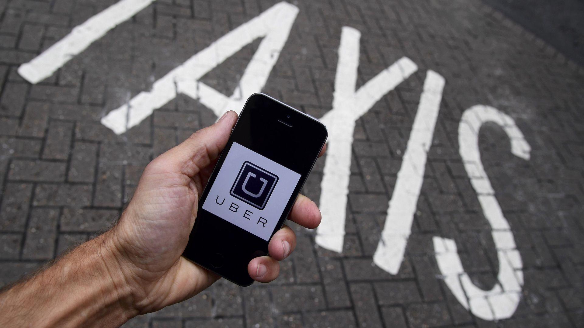 Приложение Uber для смартфона - ИноСМИ, 1920, 23.03.2017