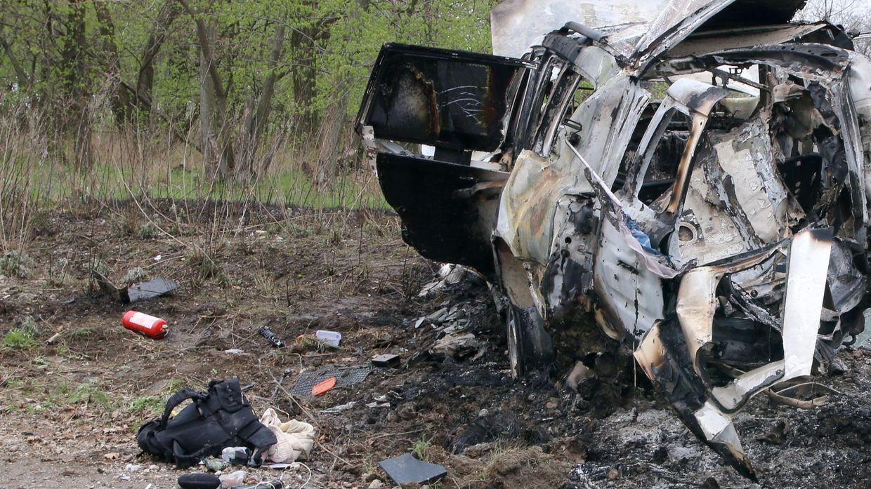 Место подрыва автомобиля сотрудников патруля Специальной мониторинговой миссии ОБСЕ на Украине в районе населенного пункта Пришиб в Луганской области