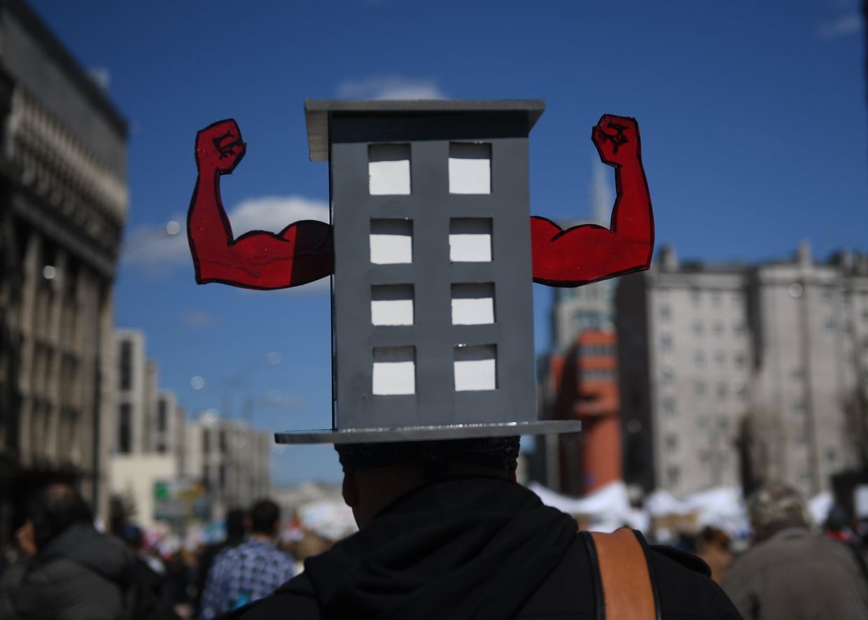 Участник митинга по программе реновации в Москве