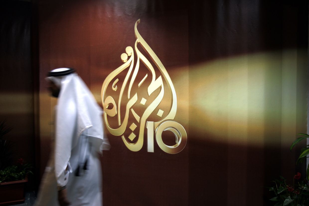 Сотрудник в офисе телекомпании Al Jazeera в Дохе, Катар