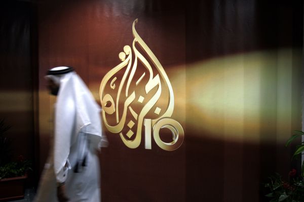 Сотрудник в офисе телекомпании Al Jazeera в Дохе, Катар