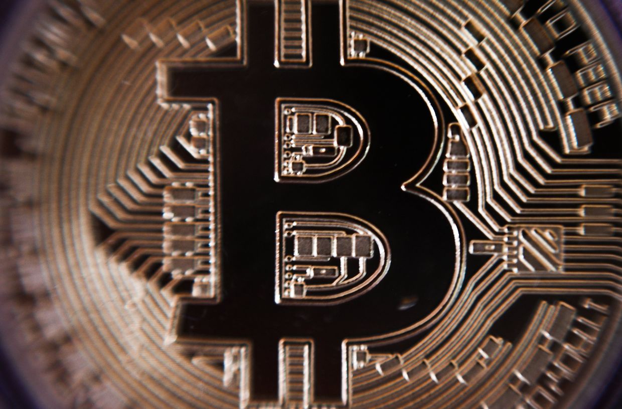 Сувенирная монета криптовалюты биткойн в MaRSe Bitcoin Center в Москве Сувенирная монета криптовалюты биткойн в MaRSe Bitcoin Center в Москве