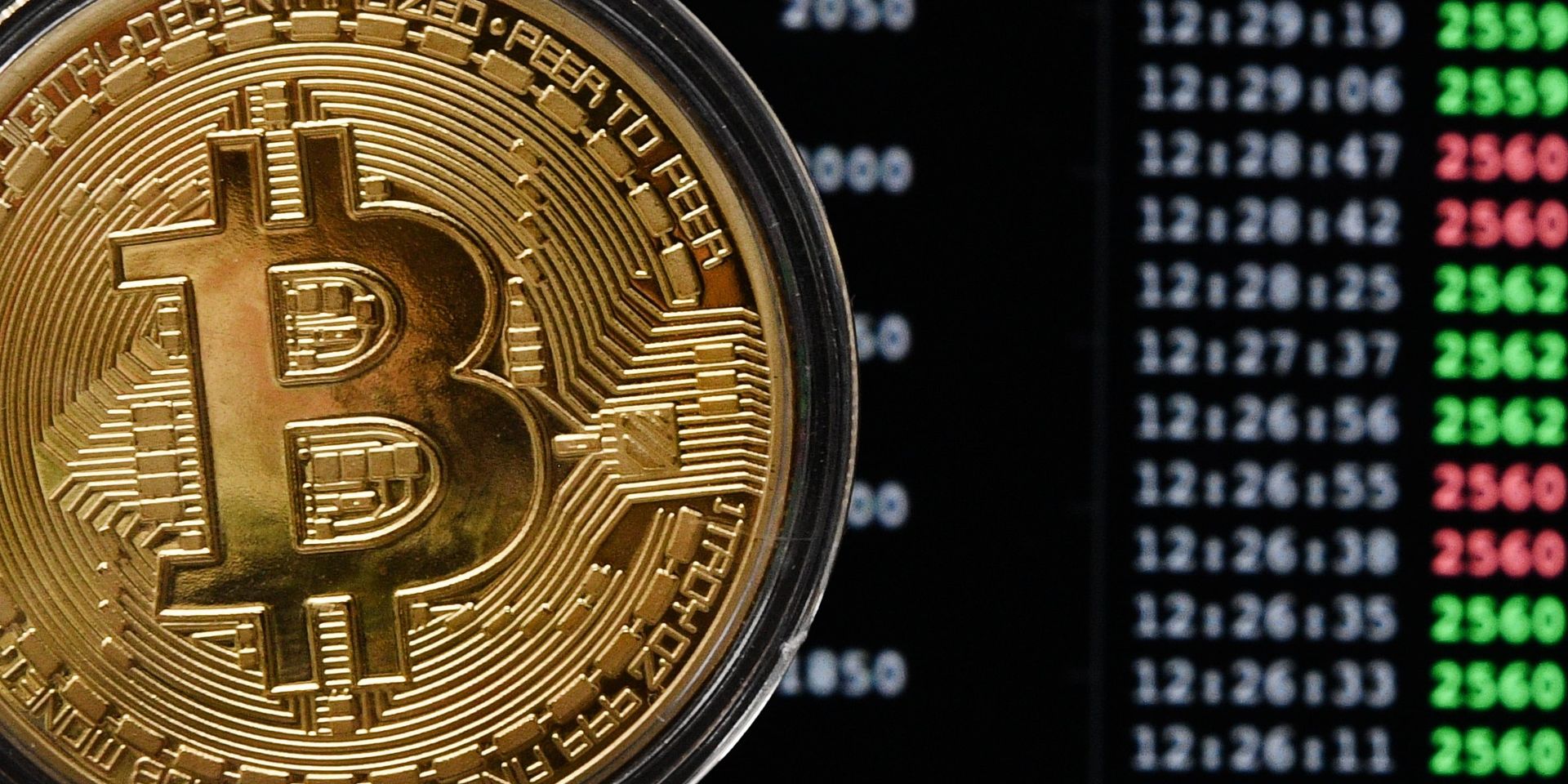Сувенирная монета криптовалюты биткойн в MaRSe Bitcoin Center в Москве - ИноСМИ, 1920, 18.08.2026