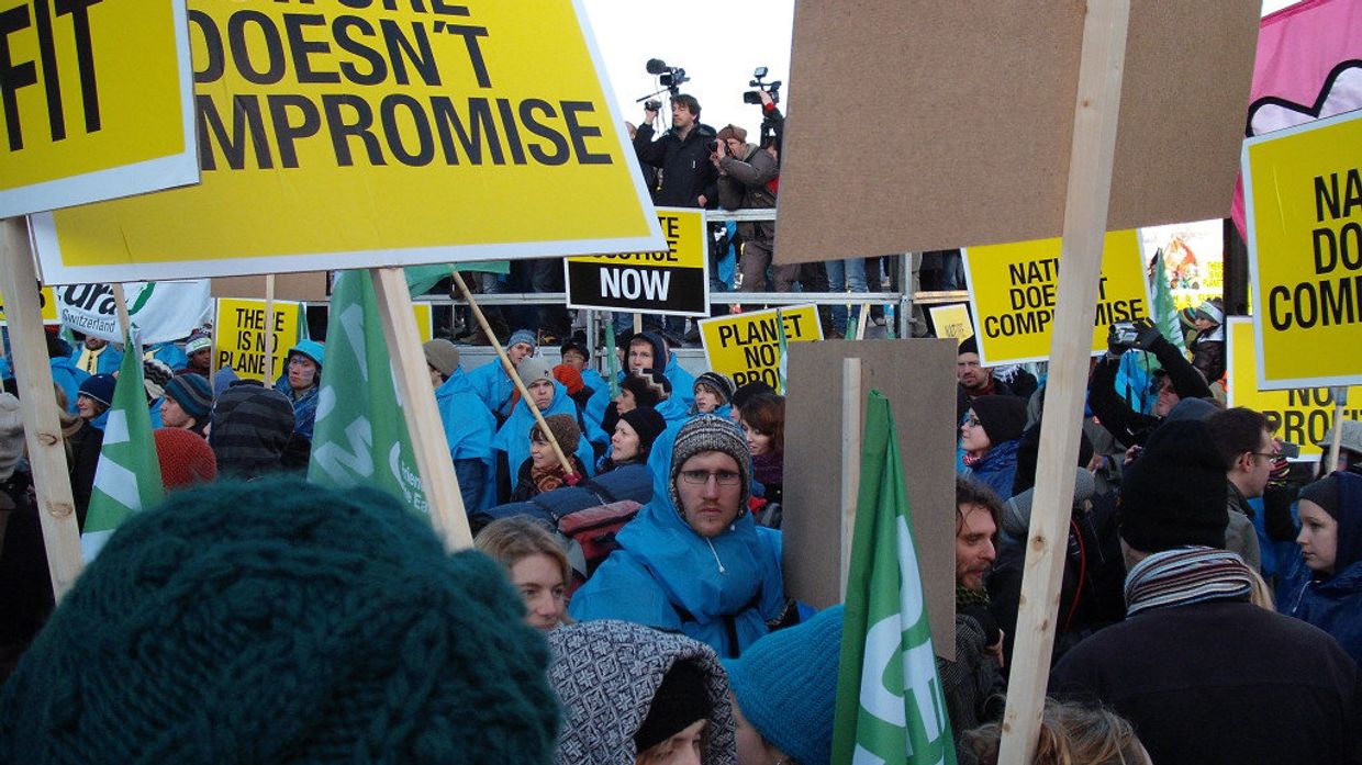 Участники протестов на саммите ООН по климату в Копенгагене в 2009 году