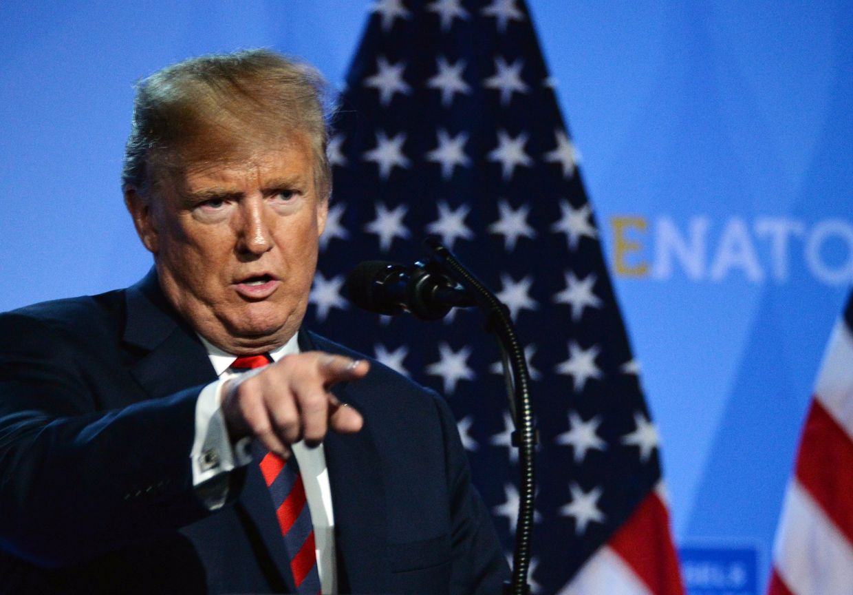 Президент США Дональд Трамп на пресс-конференции после участия в саммите НАТО в Брюсселе, Бельгии. 12 июля 2018 Президент США Дональд Трамп на пресс-конференции после участия в саммите НАТО в Брюсселе, Бельгии. 12 июля 2018