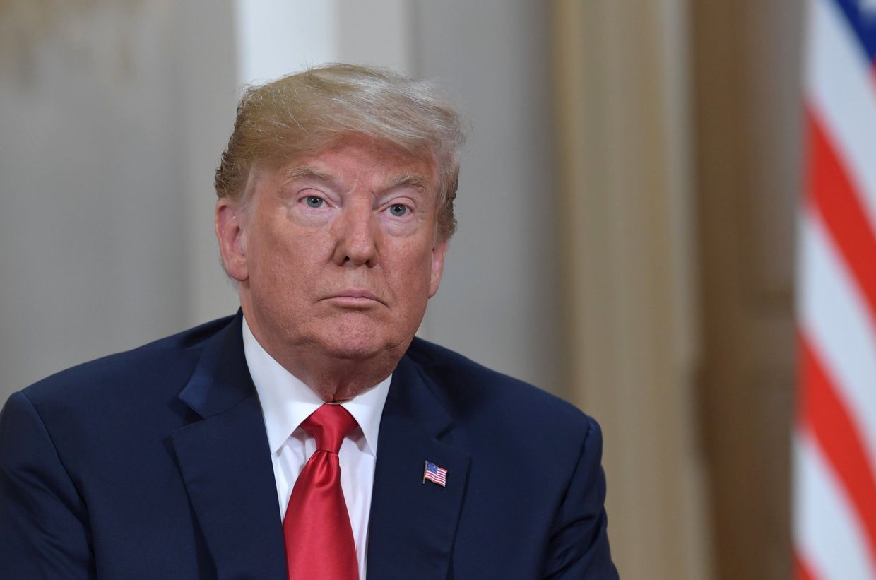 Президент США Дональд Трамп во время встречи с президентом РФ Владимиром Путиным в Хельсинки