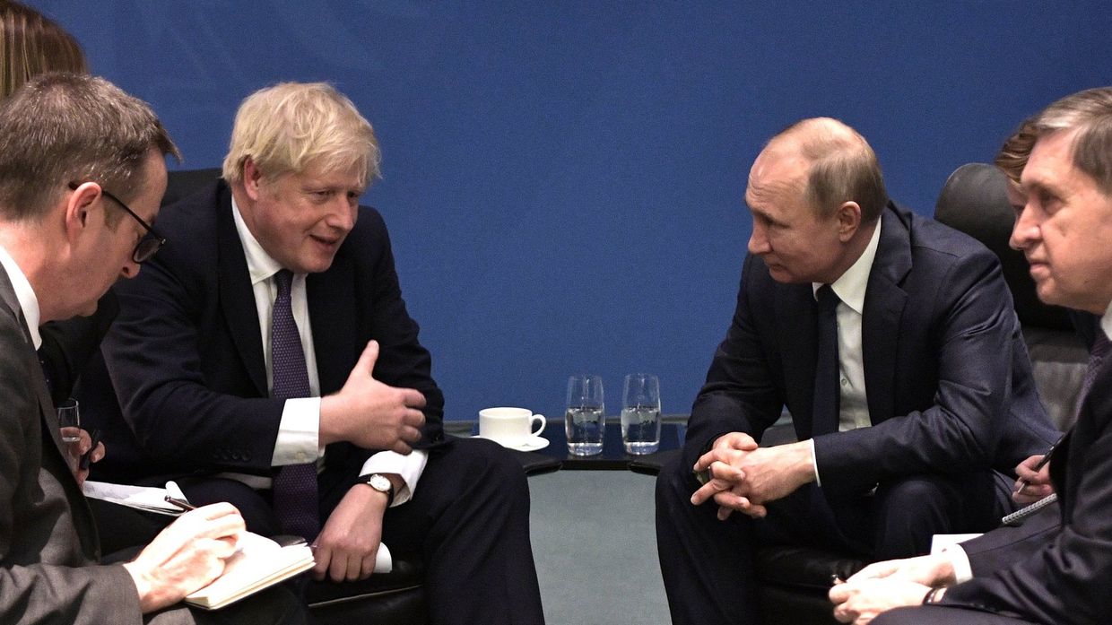 Поездка президента РФ В. Путина в Берлин для участия в Международной конференции по Ливии