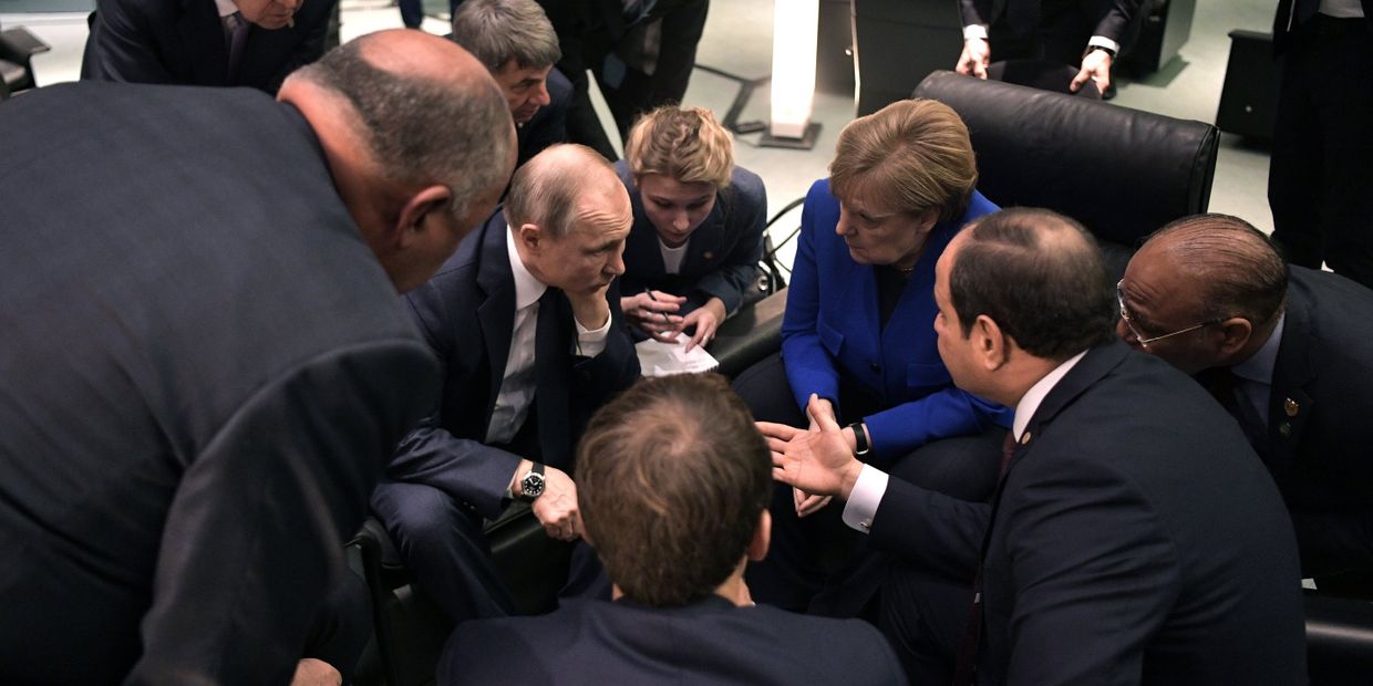 Поездка президента РФ В. Путина в Берлин для участия в Международной конференции по Ливии