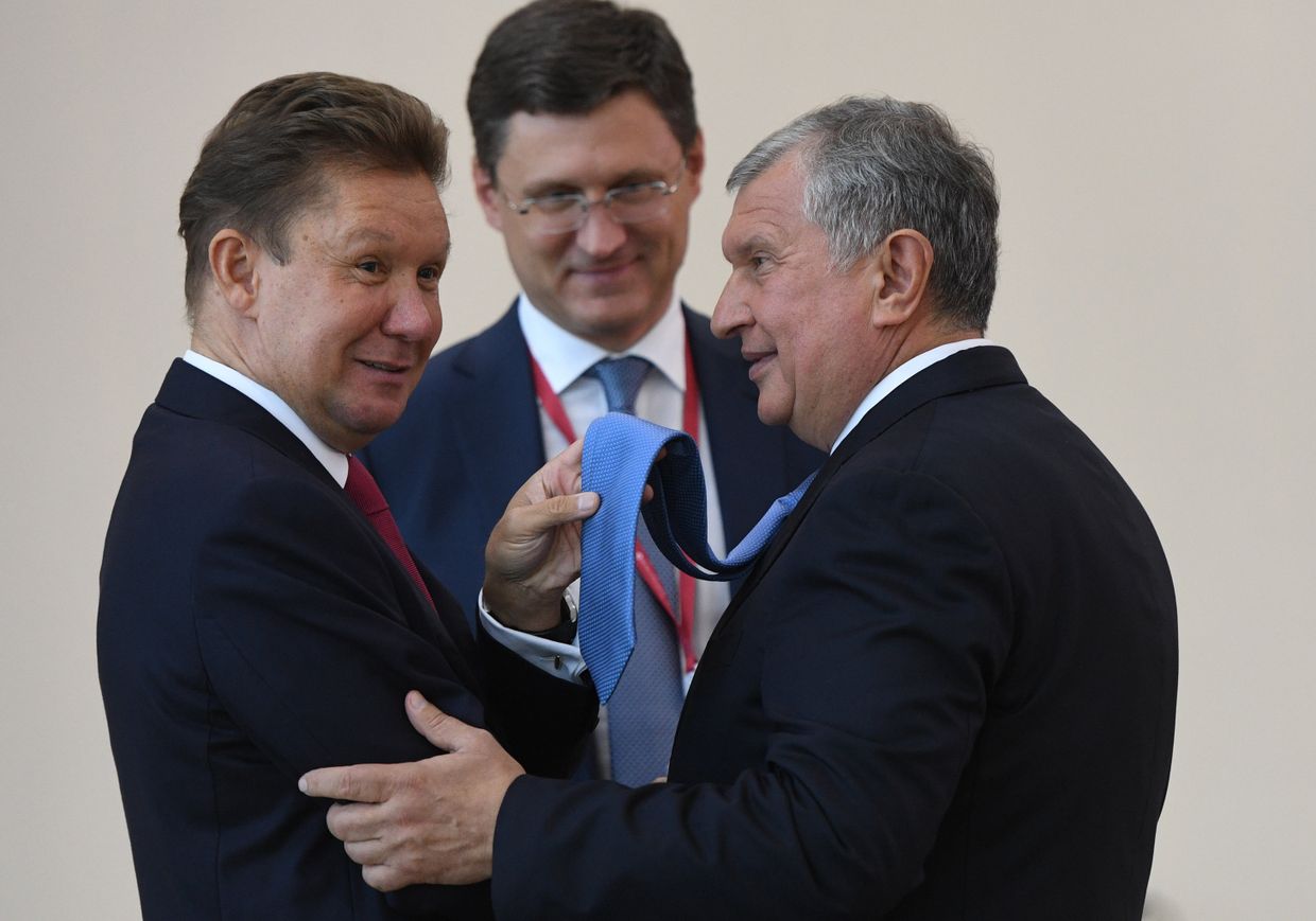 Председатель правления ПАО Газпром Алексей Миллер, министр энергетики РФ Александр Новак и главный исполнительный директор ПАО НК Роснефть Игорь Сечин